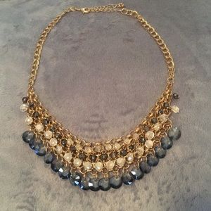 Blue and gold colored necklace